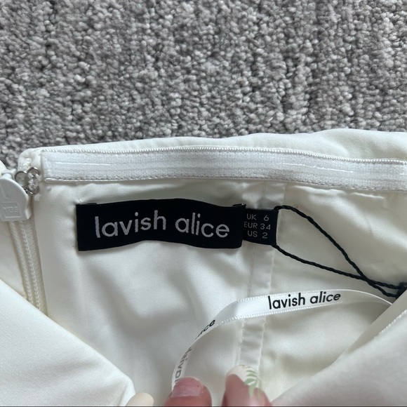 Lavish Alice Off-The Shoulder Wrap Minidress - Picture 6 of 7